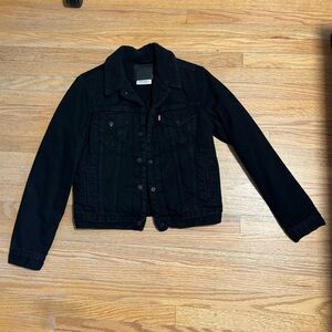 Black Levi’s denim jacket